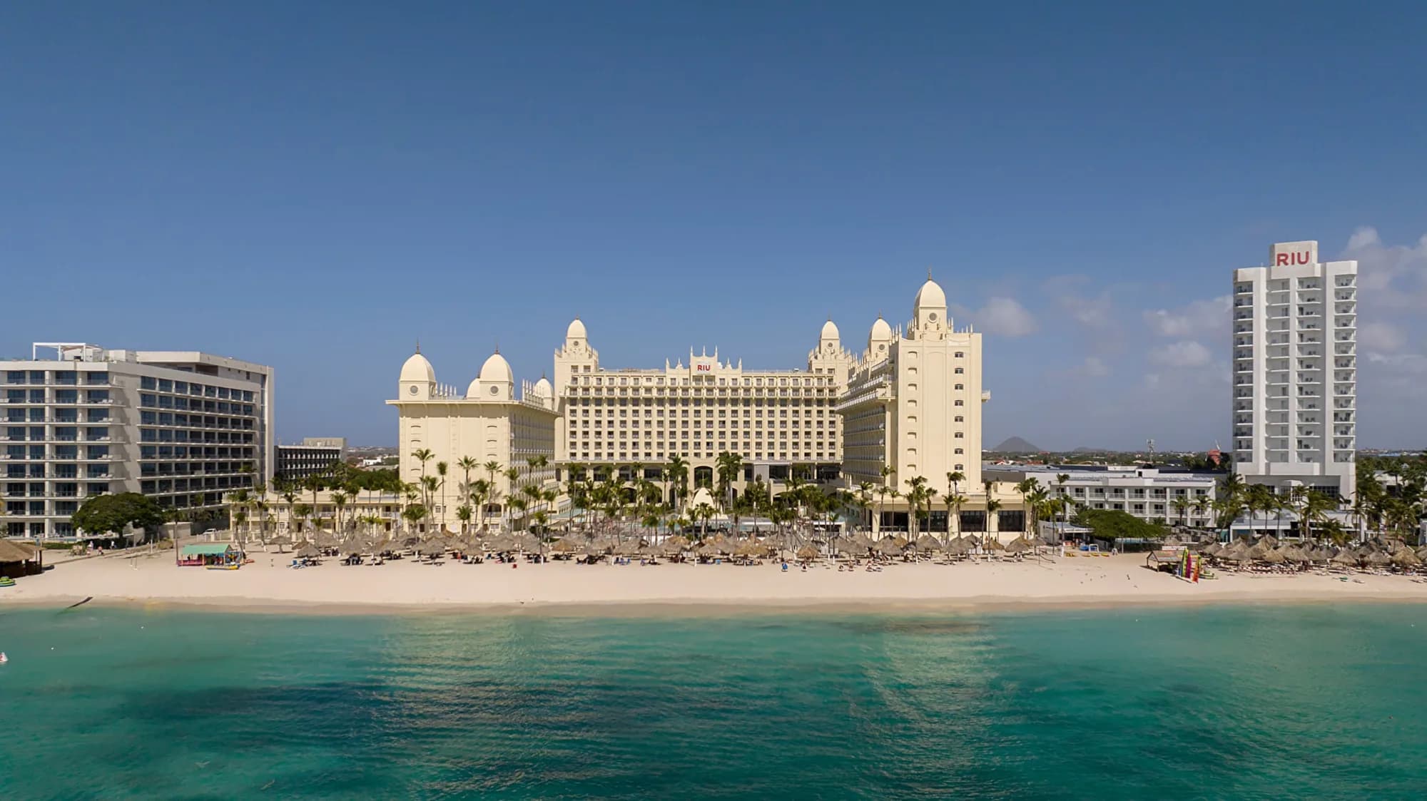 Hotel seen from the sea with beach