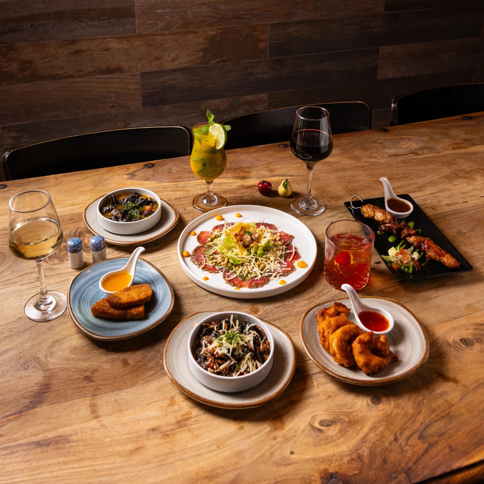 Table spread of tapas plates and drinks